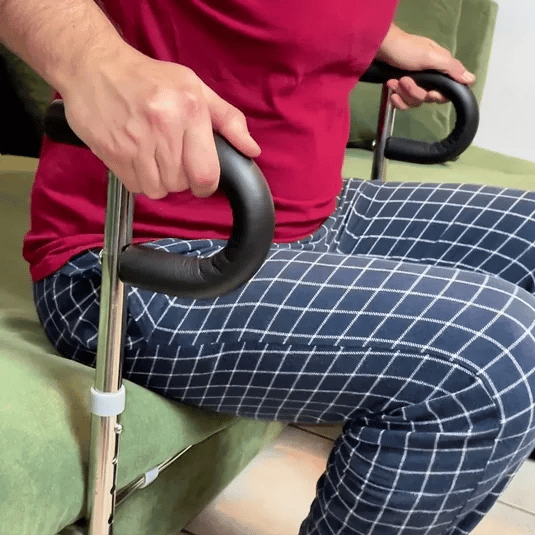 SteadyRail mounted under sofa, angled view showing adjustable legs