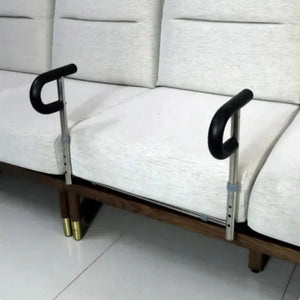 SteadyRail installed under cream sofa cushions
